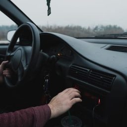 Person driving a car