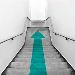 flight of stairs with a downward arrow