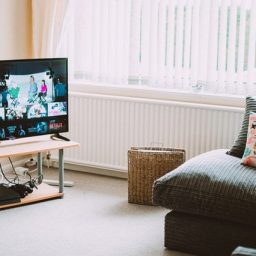 turned-on-flat-screen-smart-television-ahead-1444416