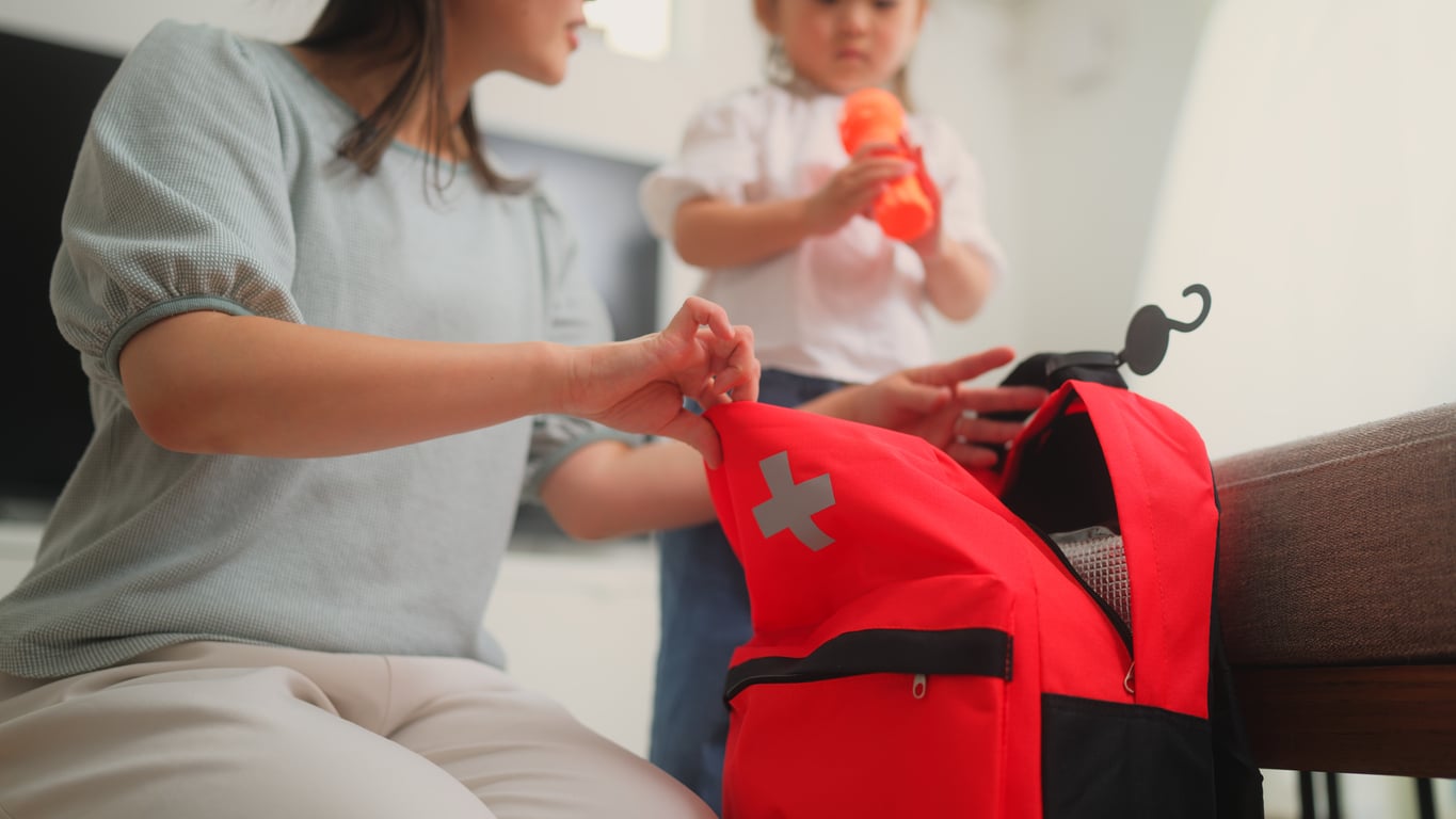 Woman prepares emergency bag