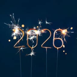 2026 sparklers on a blue background.
