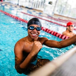 Portrait of a young man in the swimming pool.