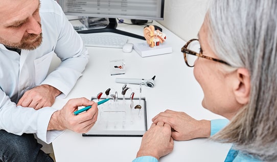BTE hearing aids are recommended by audiologist to his patient because it is best hearing solutions for her.
